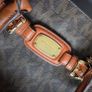 Michael Kors brown signature large handbag with shoulder strap. Spacious interior with multiple pockets. In perfect condition apart from one small tear, as shown in the photo. Image 7