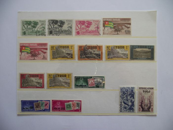 The collection of old stamps from French colonies on stock cards