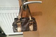 Small chocolate brown handheld bag
