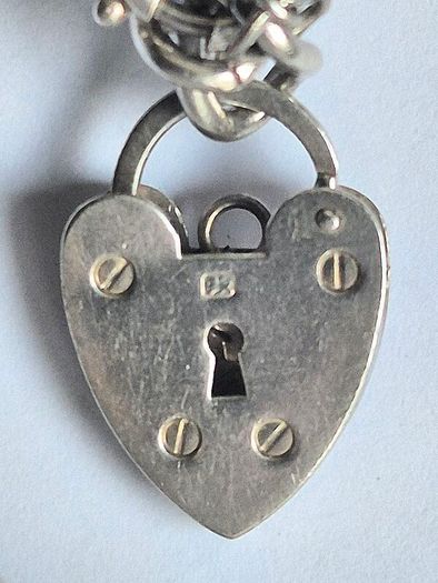 Vintage Irish Sterling Silver 14pc Charm Bracelet, Thomas O'Connor Charm Maker. Inc 1942 Pre Decimal Threepence, Dated Heart Padlock, Dublin Hallmarked