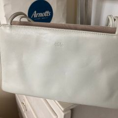 Tula leather fold-over clutch bag,