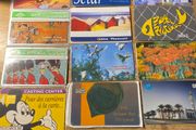 Collection of 12 vintage international phonecards