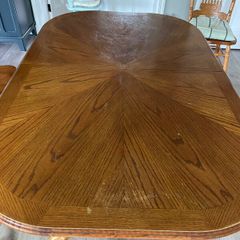 Solid oak extending table and 4 chairs 2carvers