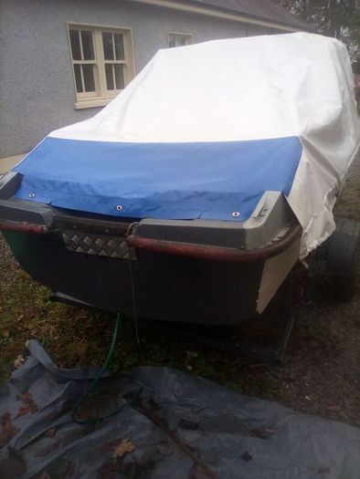 Boat and trailer  and cover