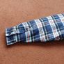 Check quilted jacket. Image 9