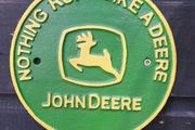nothing runs like a deer  cast  iron sign