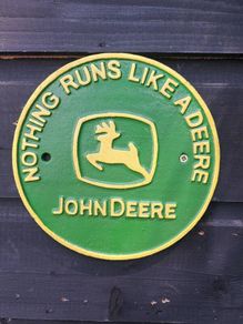 nothing runs like a deer  cast  iron sign