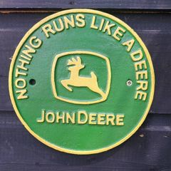 nothing runs like a deer  cast  iron sign
