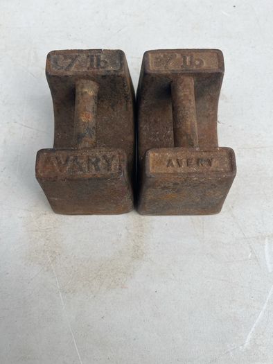 2 antique 7lb weights