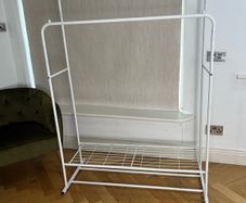 Double clothes hanging rail