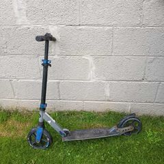 Blue folding kick scooter