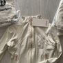 White and gold zip up Image 3