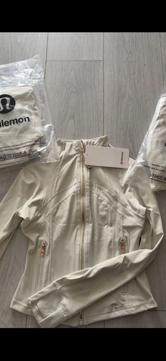 White and gold zip up