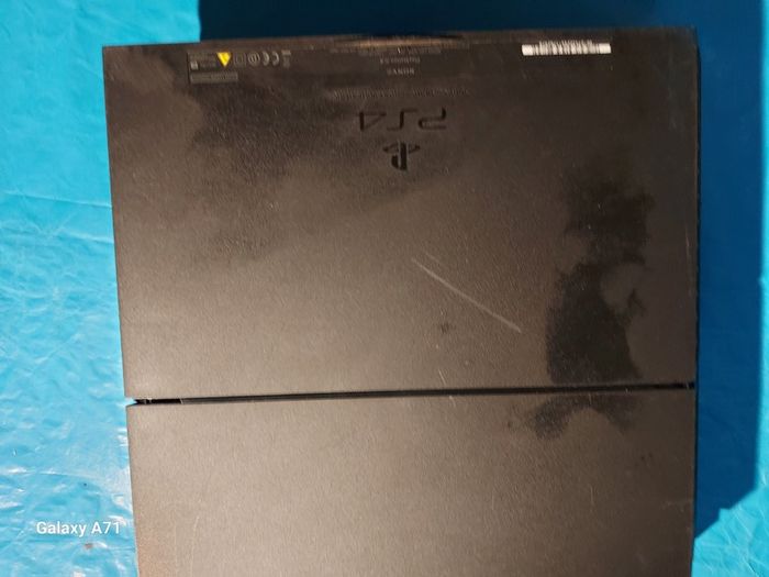 Playstation 4, Model CUH-1216A. Powers on and Off, comes with power cable only,