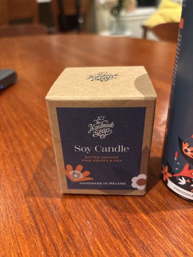 The Handmade Soap Company Hand Lotion ( bitter orange, pink pepper and hay ) and matching candle 70 grams