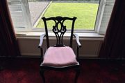 Traditional mahogany carver chair with pink upholstered seat