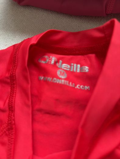 O Neills red size M rash vest