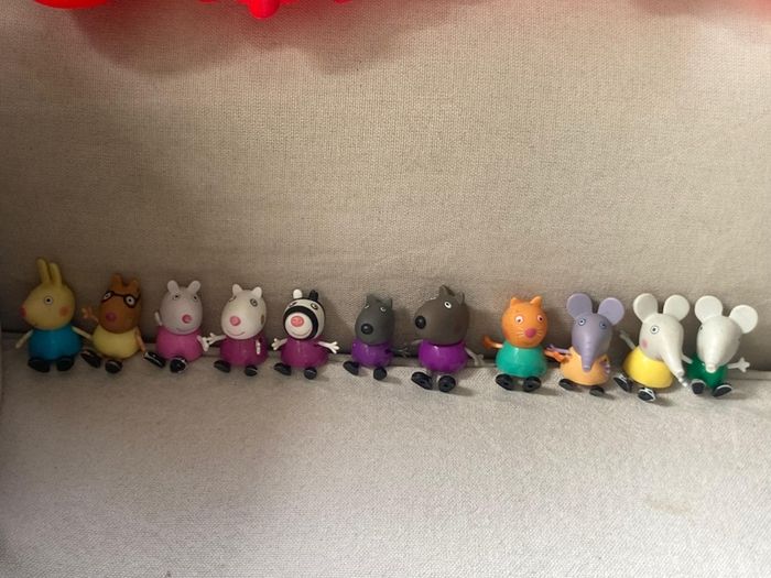 Peppa pig characters and suitcase
