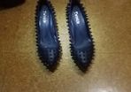 Trendy spike black wedge
