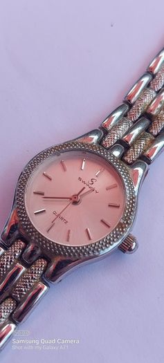 ladies watch swing quartz ,working prefect,,price includes post to anywhere in Ireland thank you, see pictures for condition, used