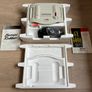 Boxed Amstrad GX4000 console with 2 controllers, cables, inserts, and pack-in game Image 5