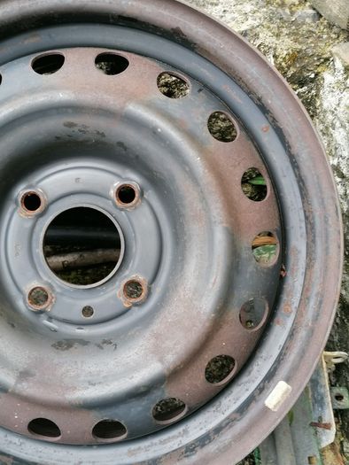 2 x steel rims 15", 4 stud, about 114mm ish from hole centre to the opposite home centre... Possibly fit a nissan etc