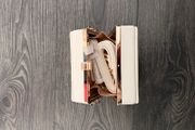 Cream box bag with gold trim