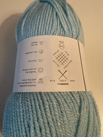 6 balls of blue yarn wool