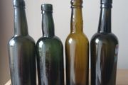 Lot of 4 vintage Guinness bottles