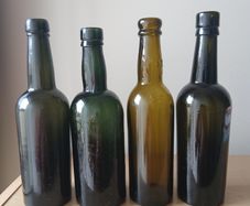 Lot of 4 vintage Guinness bottles
