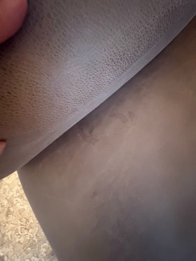 Leather sofa with original harvey Norman tag still attached