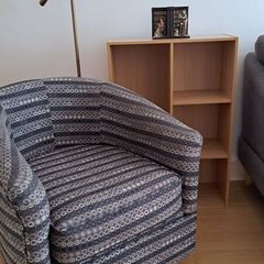 Tub chair, floor light and bookcase