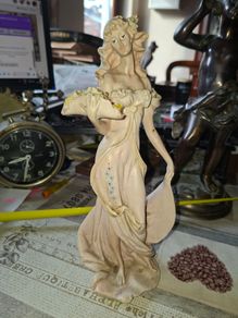 Beautiful Old Figurine distinctive Art Nouveau style of Italian sculptor, depicting an elegant woman in a flowing pastel gown holding a floral arrangement, Postage Available or Collection