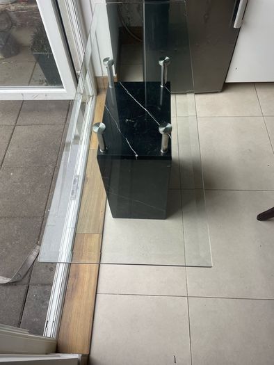 Glass table top and marble base