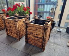 2 wooden planters