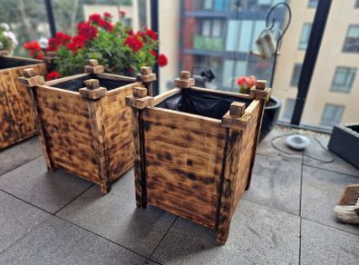 2 wooden planters