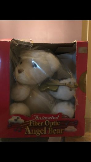Angel Bear, plays Silent Night on violin