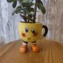 plant with plant holder Image 2