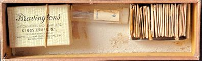 Box containing empty Bravingtons stock box and some balance staffs