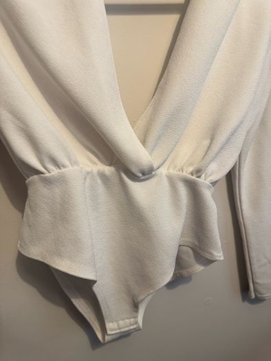 white bodysuit