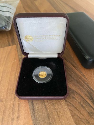 4 silver oz coins & 0.5g gold coin