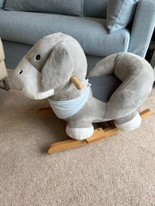 Mamas & Papas Ellery the Rocking Animal in gray plush.