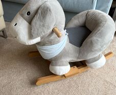 Mamas & Papas Ellery the Rocking Animal in gray plush.
