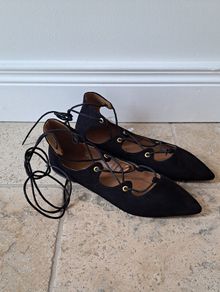 Black suede flats