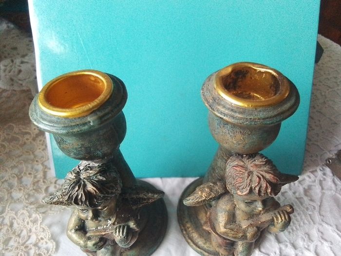 Two Churub Candlesticks