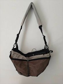 Cote and Ciel reversible mesh sling bag