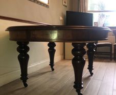 Solid mahogany table on castors