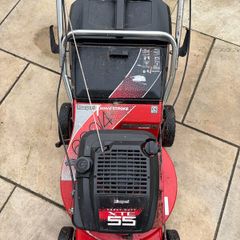 Lawnmower ,  +  a scarifier blade .