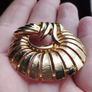Vintage gold tone brooch. Image 4