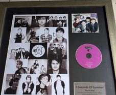 Signed and framed 5 Seconds of Summer CD